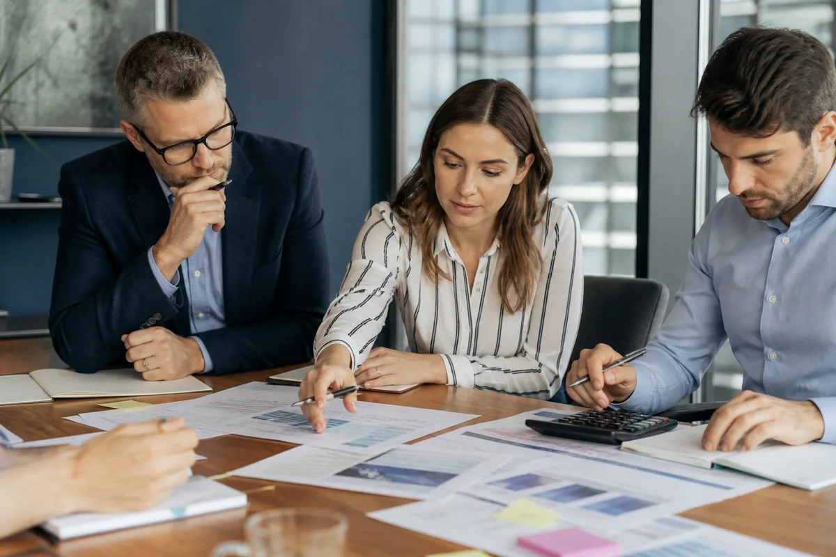 Professionals carrying out pricing & commercial strategy work